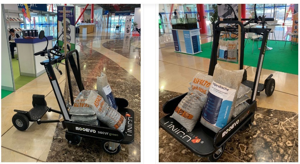 Ver carrito electrico para reparar baches asfalto